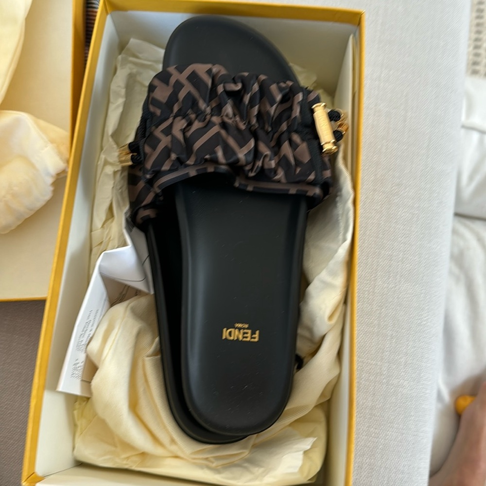 Fendi logo slides